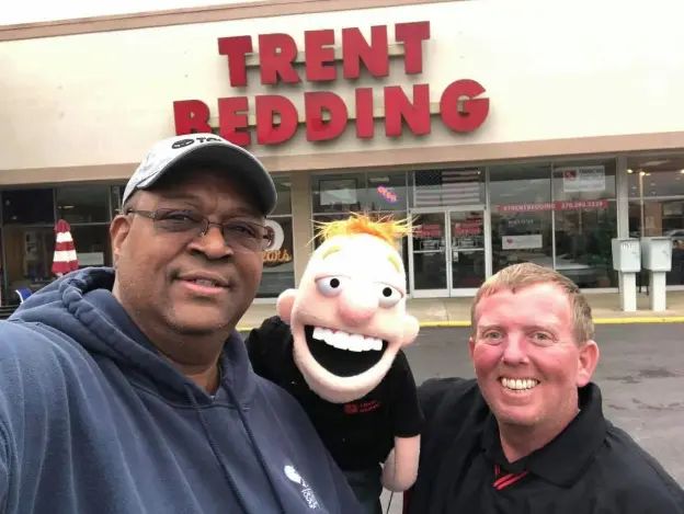 Connect 4 Charity hosts with Lil’ Trent outside the Trent Bedding store