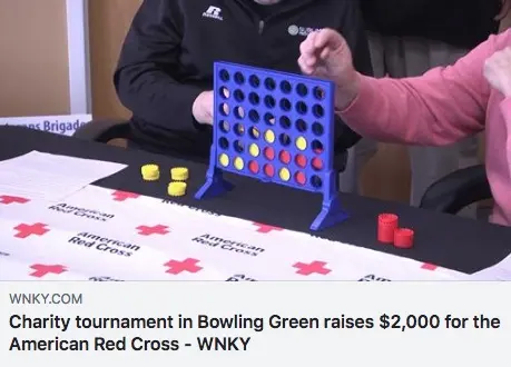 Connect 4 game at a charity tournament for the American Red Cross